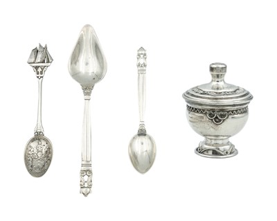 Lot 127 - A selection of silver to include two Georg Jensen spoons, one other spoon and a lidded pot.