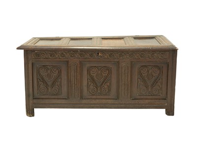 Lot 713 - An oak panel coffer.