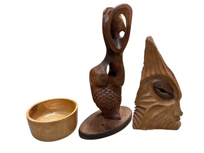 Lot 62 - Two carved wooden sculptures, both signed...