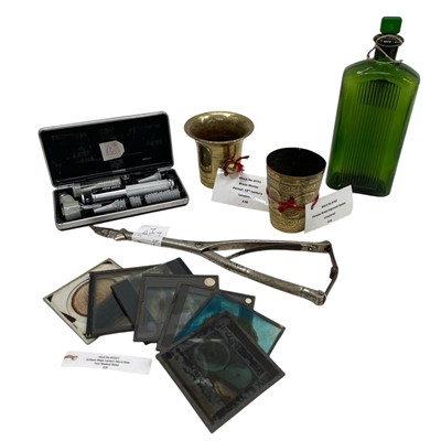 Lot 59 - A Heine Alpha Otoscope set, a Simpsons...