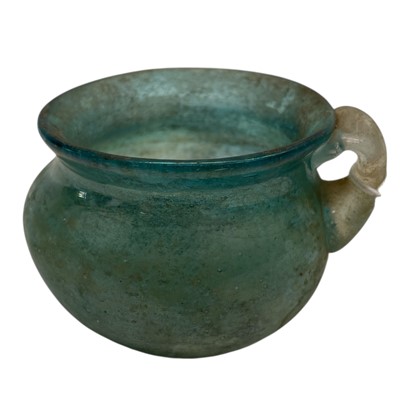 Lot 14 - Believed to be a Roman glass cup in...
