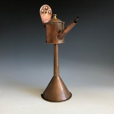 Lot 331 - A copper pilchard oil wick lamp or chill,...