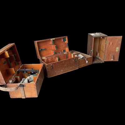 Lot 98 - Two theodolite boxes, a microscope box and a...