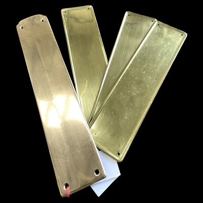 Lot 127 - Three brass and one bronze finger plates,...