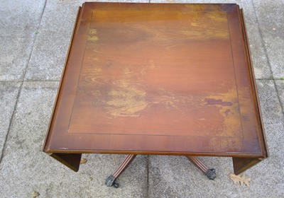 Lot 122 - A Drop-Leaf Pedestal Table. The Table is 49cm...