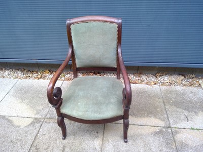Lot 123 - An Antique Oak Armchair.