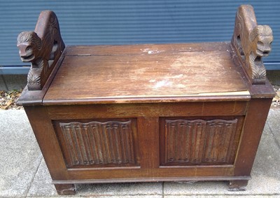 Lot 15 - An Oak Hall Bench with Carved Lion Arms with...
