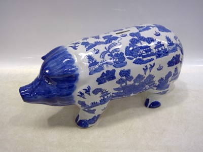 Lot 136 - A Willow Pattern Pig Moneybox. The Pig is 23cm...