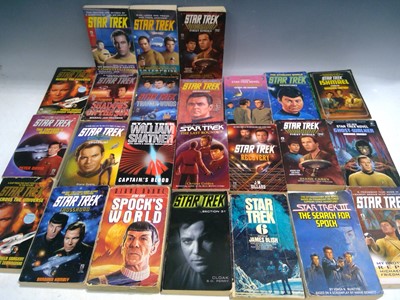 Lot 142 - Twenty-Four Star Trek Paperbacks.