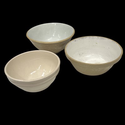 Lot 154 - Three earthenware bowls, the largest being...
