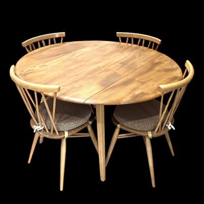 Lot 7 - Mid-century Ercol dining table and four...