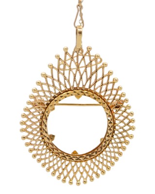 Lot 60 - A 9k gold sovereign frame pendant/brooch.