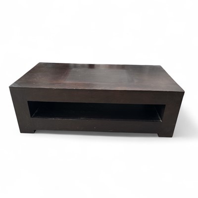 Lot 168 - A contemporary wooden TV stand, 110cm wide,...