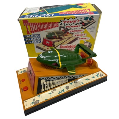 Lot 180 - A Thunderbirds talking alarm clock in its...