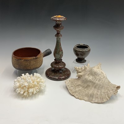 Lot 201 - A Cornish serpentine turned candlestick,...