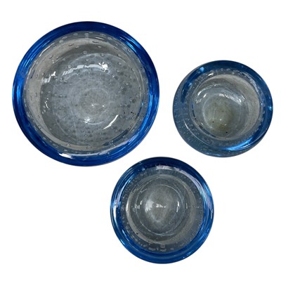 Lot 239 - Three Whitefriars blue glass dishes. One 15cm...