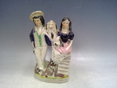 Lot 195 - A Staffordshire Flatback. The piece is 17cm tall.
