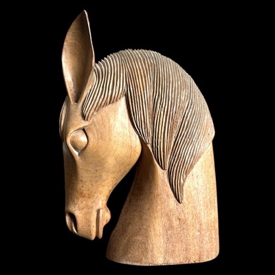Lot 52 - A hardwood carved stylised horse's head,...