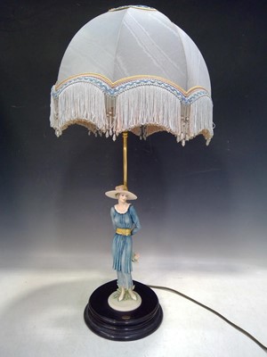 Lot 21 - A Giuseppe Armani Table Lamp. The Lamp is 72cm...