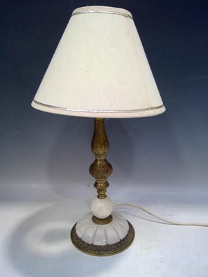Lot 23 - A Brass and Onyx Table Lamp. The Lamp is 44cm...