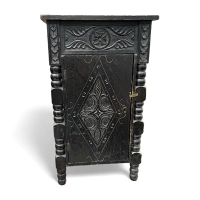 Lot 58 - An antique oak carved and bobbin turned side...