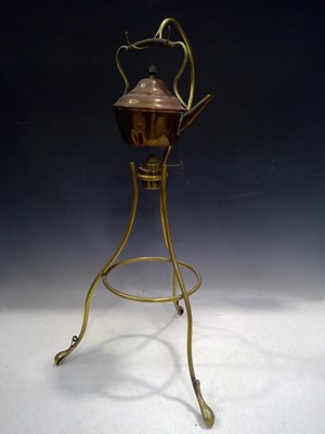 Lot 12 - An Antique Copper and Brass Spirit Kettle. The...