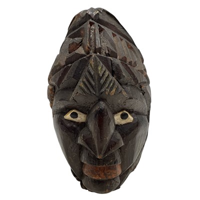 Lot 42 - A large Old Caribbean Carved Coconut. 20cm High.