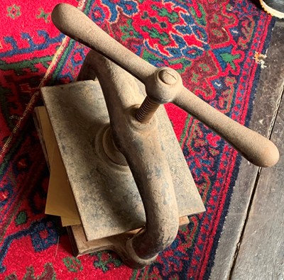 Lot 191 - A book binder's iron nipping press, width 40cm....