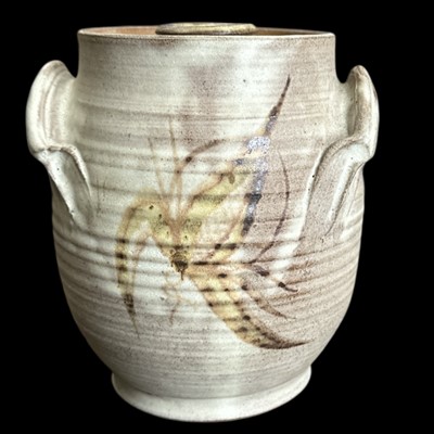 Lot 84 - A studio pottery lidded jar, 17cm tall and...