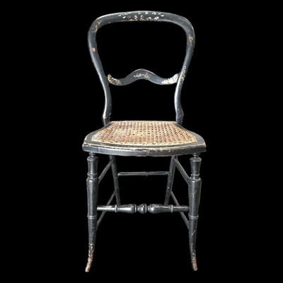 Lot 95 - An ebonised and mother-of-pearl inlaid...