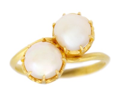 Lot 46 - A higher-purity gold, two-cultured pearl Toi Et Moi ring.