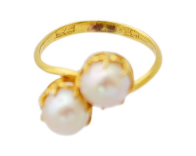Lot 46 - A higher-purity gold, two-cultured pearl Toi Et Moi ring.