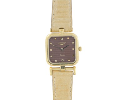 Lot 1031 - LONGINES - A quartz lady's gold-plated dress wristwatch.
