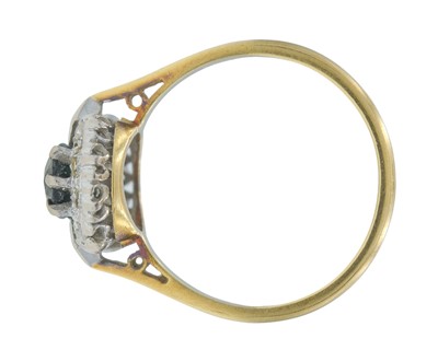 Lot 7 - An 18k gold teal sapphire and diamond cluster ring.