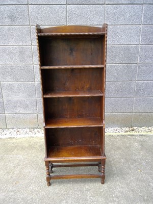 Lot 17 - An Oak Bookcase with Beaded Detailing. The...