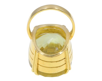 Lot A heavy 18k gold with 50ct citrine dress ring.