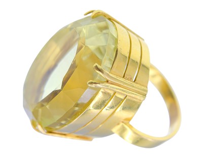 Lot A heavy 18k gold with 50ct citrine dress ring.