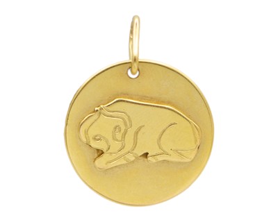 Lot 10 - An 18k gold TAURUS star sign pendant.