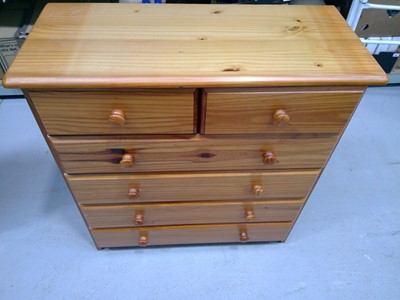 Lot 136 - A Modern Pine Chest of Drawers. The Chest...