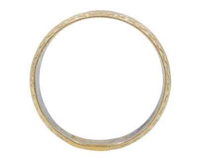 Lot 23 - A 9k gold wide engraved band ring.