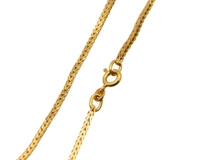 Lot 17 - A 21k gold 27" foxtail chain.
