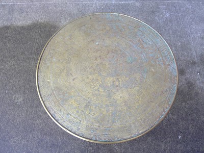 Lot 154 - A Round Brass Covered Coffee Table with...
