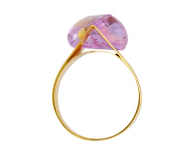 Lot 35 - An unusual design, 21k gold CZ dress ring.