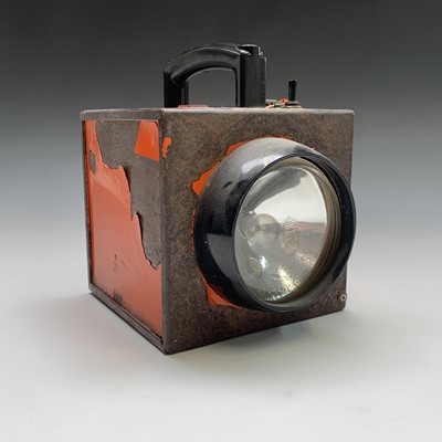 Lot 59 - A Swinford metal cased battery hand lantern,...