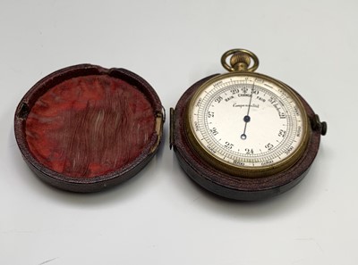 Lot 151 - A late 19th century gilt pocket barometer,...