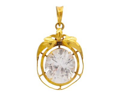 Lot 89 - A high-purity gold and white synthetic sapphire pendant.