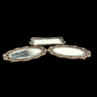 Lot 195 - Three small metal and bevelled-edged mirrored...