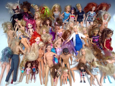 Lot 212 - A Large Collection of Barbies and Kens.