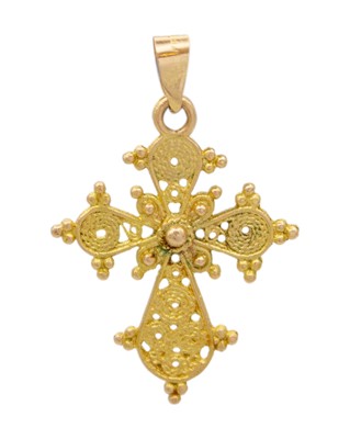 Lot 111 - A 14k gold filigree cross pendant.