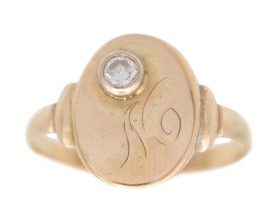 Lot 116 - A higher purity gold and diamond signet ring.